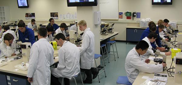 A school group at work in the teaching lab